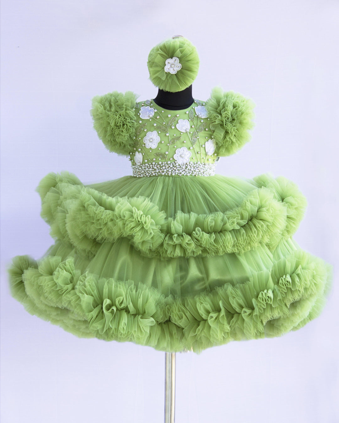 Pista Green Shade Handwork Heavy Ruffles Baby-Girls Partywear Frock
Material: Pista Green shade handwork baby-girls step frock is made with soft mono nylon net fabric. Yoke part is designed with white flower and beads handwork. Whi
