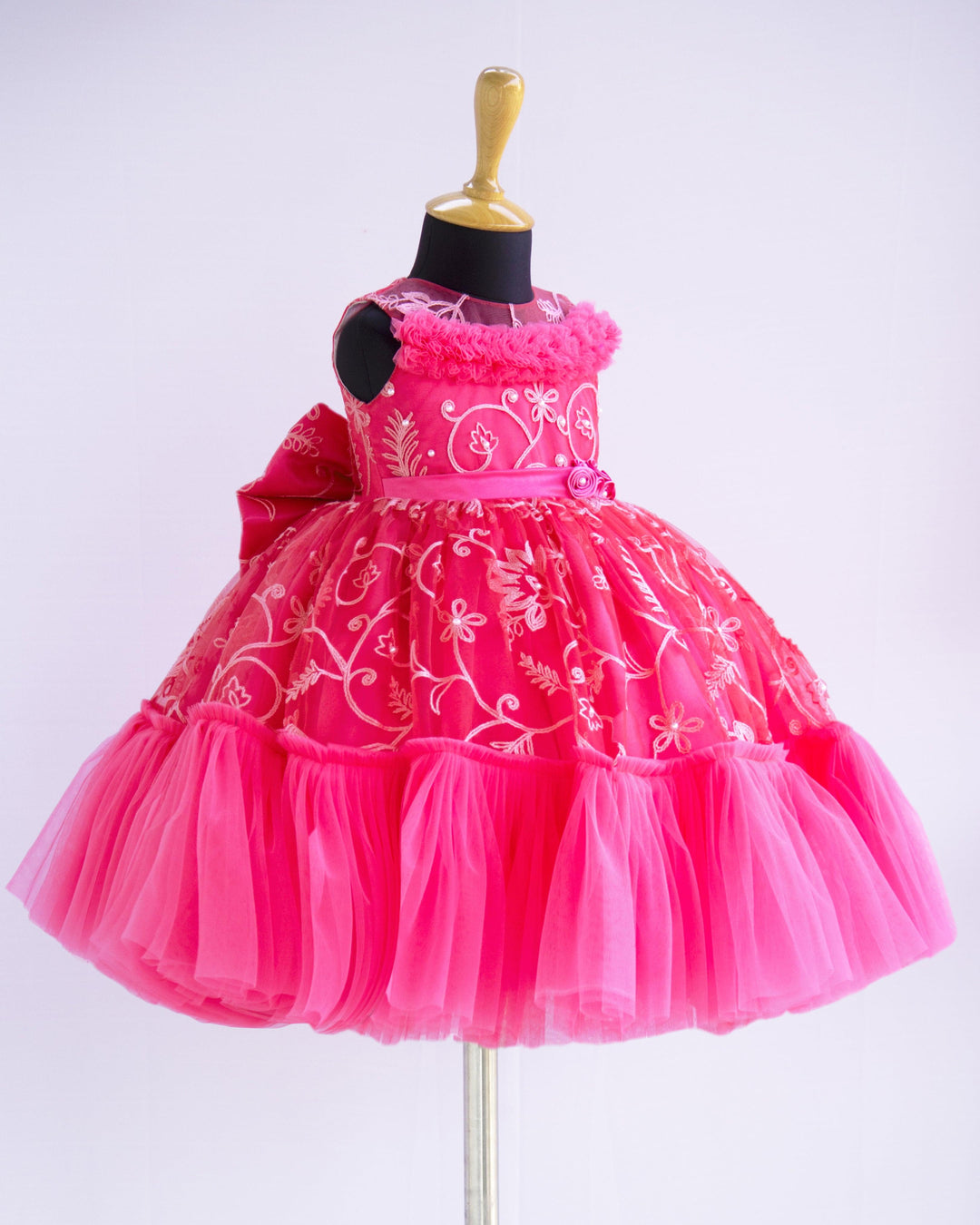 Peach Shade Thread Embroidery Ruffles Partywear Flower Frock
Material: Bright peach thread embroidery party wear flower frock is made with soft nylon net fabric. The yoke portion of the frock is fully completed in a ruffled p