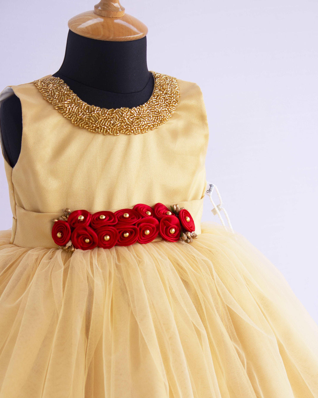 Golden Shade Handwork Baby-Girls Partywear Flower Frock
Material : Golden shade handwork party wear birthday flower frock is made with soft nylon net fabric. The yoke portion of the frock is designed in a simple look wit