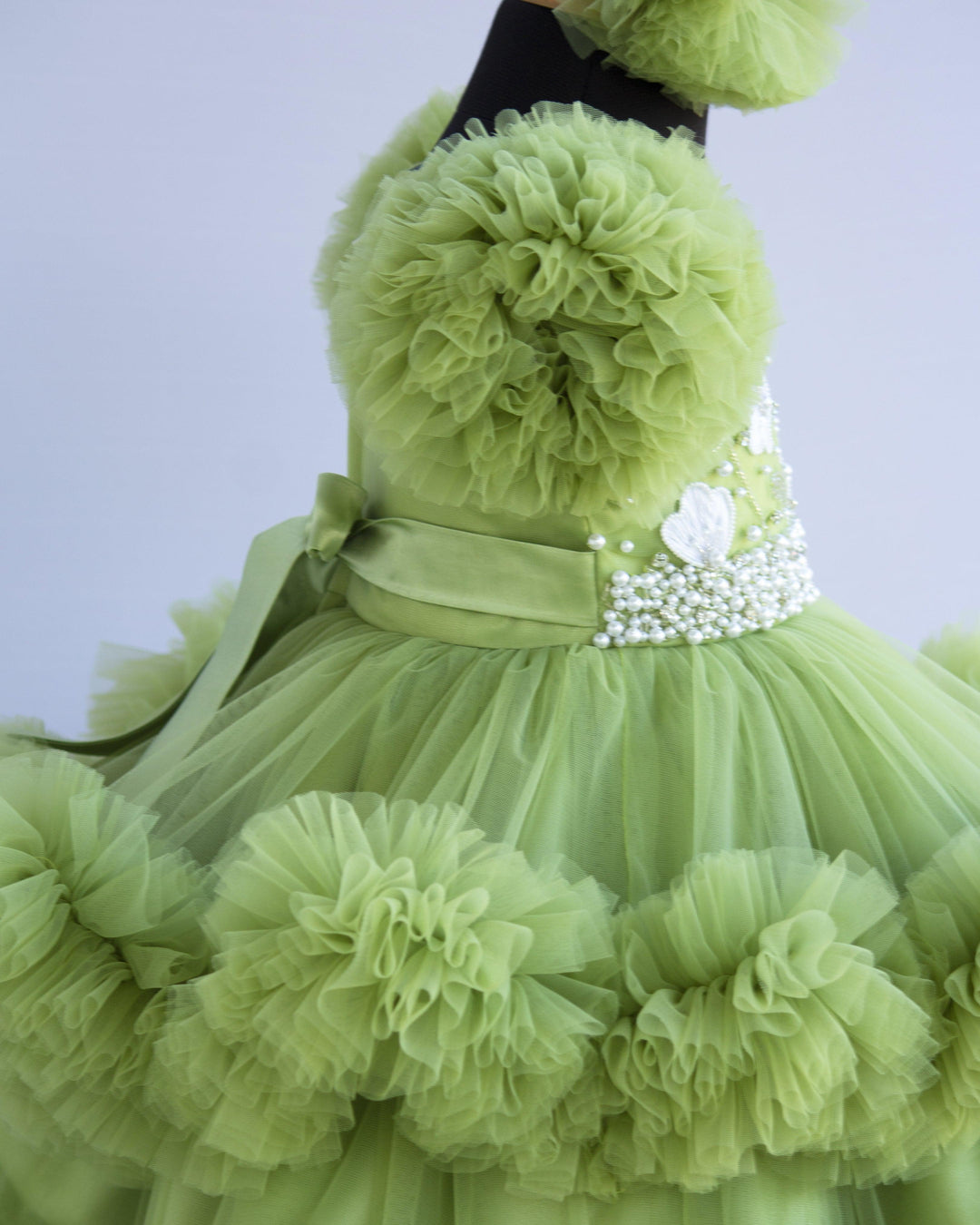Pista Green Shade Handwork Heavy Ruffles Baby-Girls Partywear Frock
Material: Pista Green shade handwork baby-girls step frock is made with soft mono nylon net fabric. Yoke part is designed with white flower and beads handwork. Whi