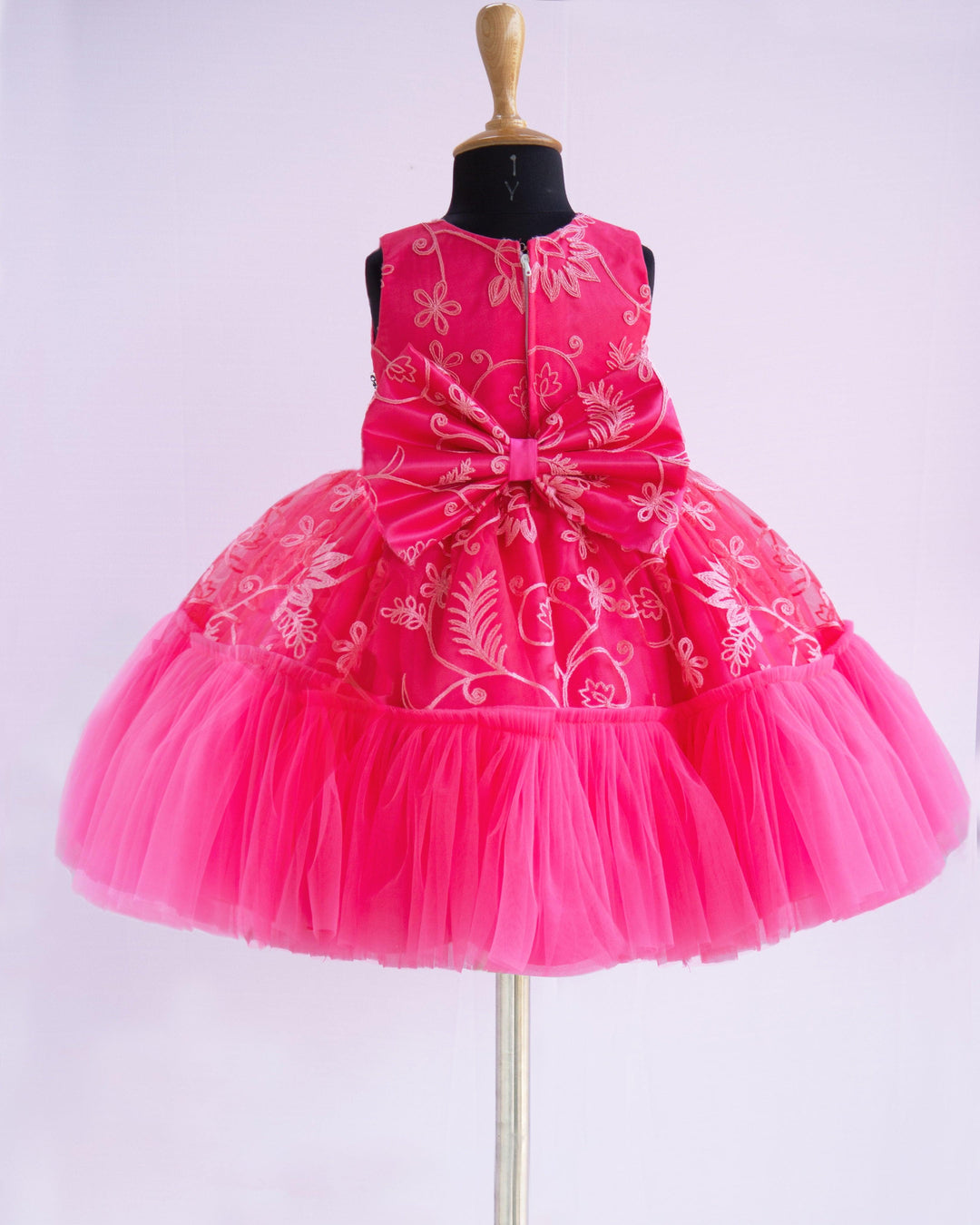 Peach Shade Thread Embroidery Ruffles Partywear Flower Frock
Material: Bright peach thread embroidery party wear flower frock is made with soft nylon net fabric. The yoke portion of the frock is fully completed in a ruffled p