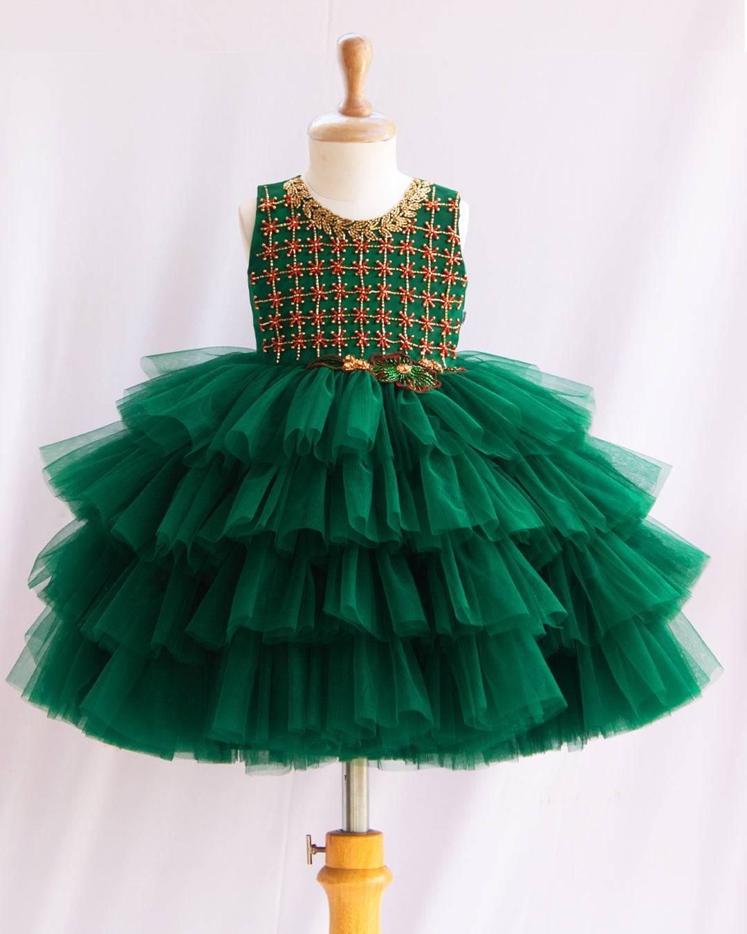 Bottle Green Hand Embroidery Layer Frock
Material: Bottle Green shade mono nylon soft net fabric layered with premium ultra satin is used for shining. Yoke portion is fully hand worked with reddish meroon