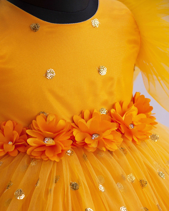 Mango Yellow Shade Heavy Sequins Party-wear Frock
Material : Mango Yellow Shade heavy sequins fabric net is used in the upper portion of the skirt. In the second layer pleated net is used for the grand and puffy lo