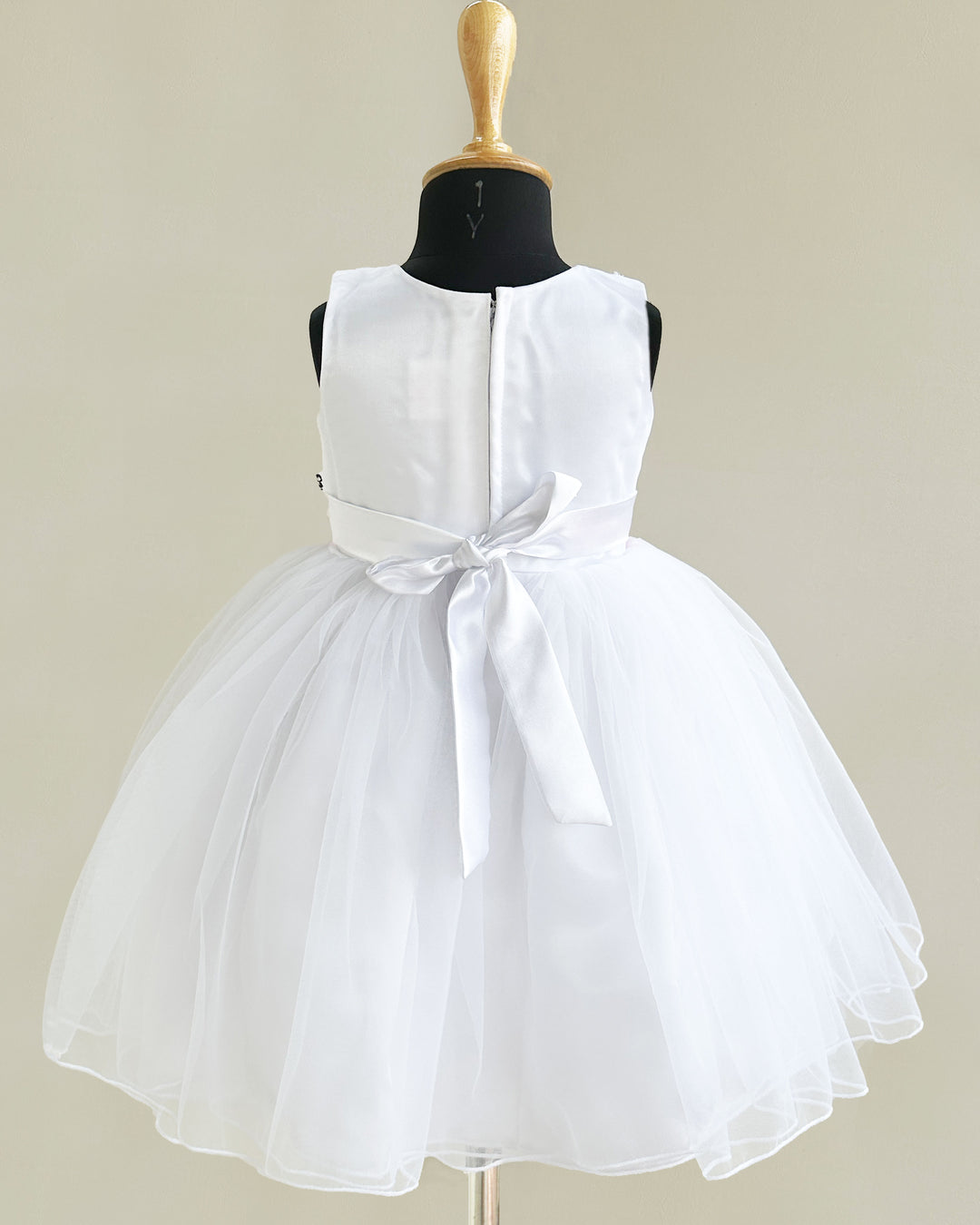 "Christmas special baby girls white pleated sleeveless birthday dress, handwork frock, party dress for girls, festive outfit for toddlers."