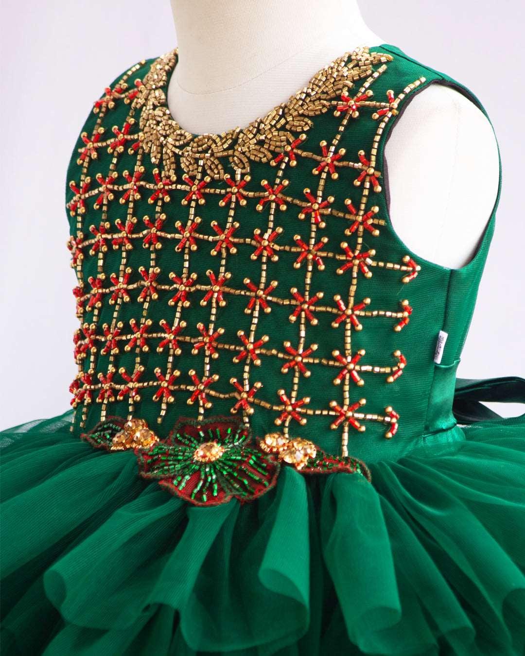 Bottle Green Hand Embroidery Layer Frock
Material: Bottle Green shade mono nylon soft net fabric layered with premium ultra satin is used for shining. Yoke portion is fully hand worked with reddish meroon