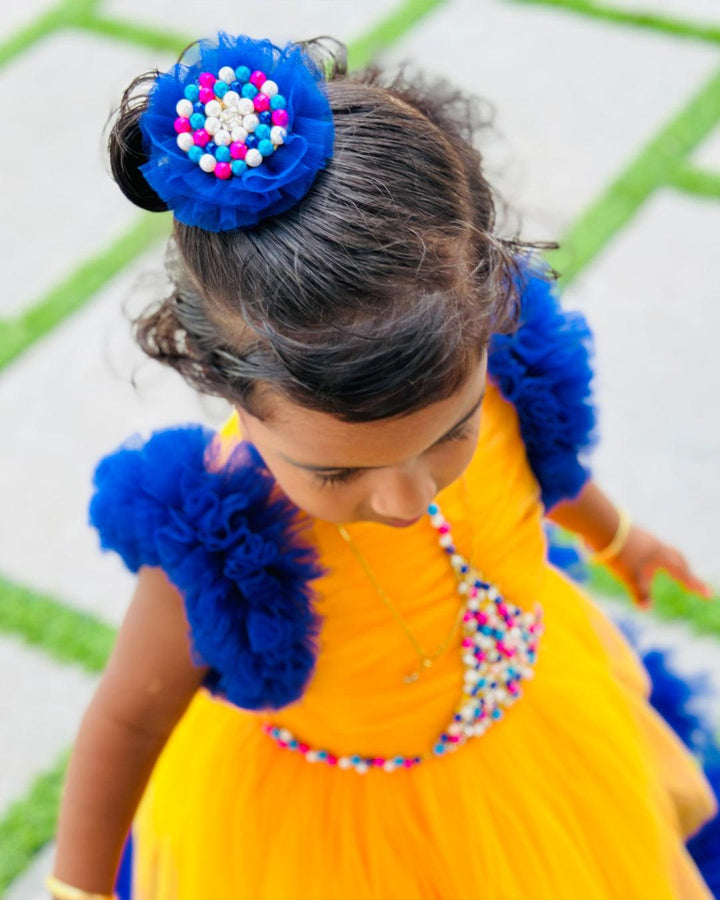 Sun Yellow & Navy blue combo Paris Handwork Birthday Gown
Material: Sun Yellow & Navy blue soft nylon net is used for making this beautiful Gown .Yoke portion of the gown is designed with yellow net with multi colours