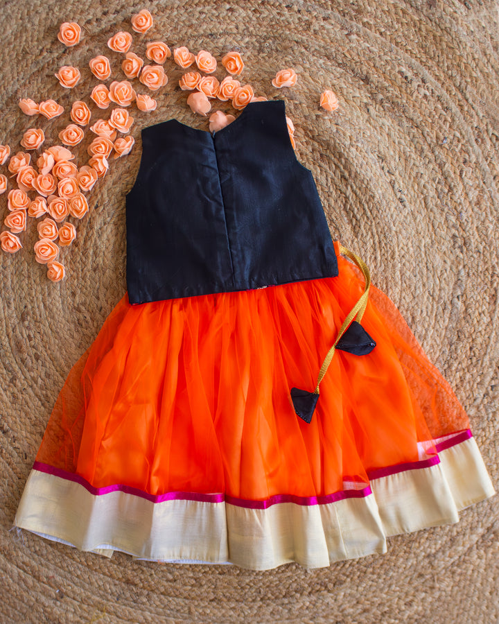 Orange and black combo lehenga choli set for baby girls
Traditional birthday dress for girls
Baby girls festive wear lehenga
Stylish ethnic dress for toddlers
Black orange designer lehenga for baby girls
Kids partywear traditional dress
Stanwells Kids ethnic birthday outfit