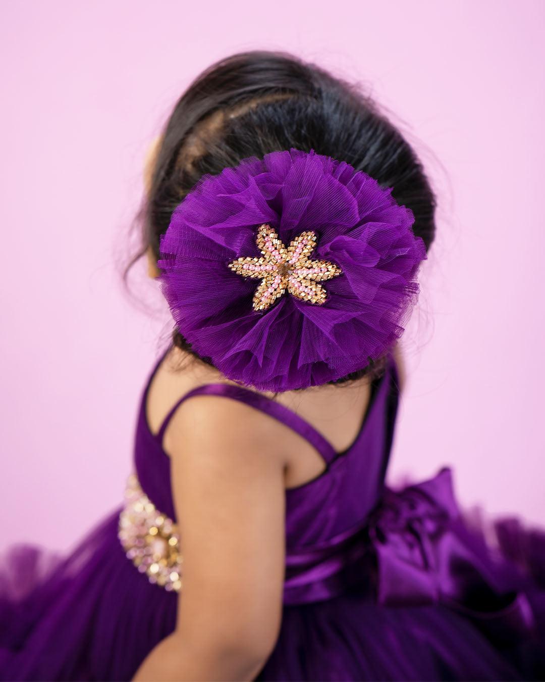 Purple Shade Pleated Ruffled Frock
Material: Purple Shade Pleated Ruffled Frock mono net with layered and ruffles on the end portion. Yoke portion is designed with pleated pattern and a handwork in t