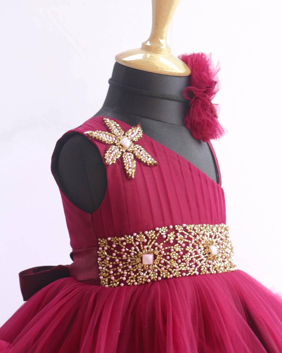 Grapevine Pleated Ruffled Birthday Frock.
Material: Aishu's Purple Shade Pleated Ruffled Frock mono net with layered and ruffles on the end portion. Yoke portion is designed with pleated pattern and a handw