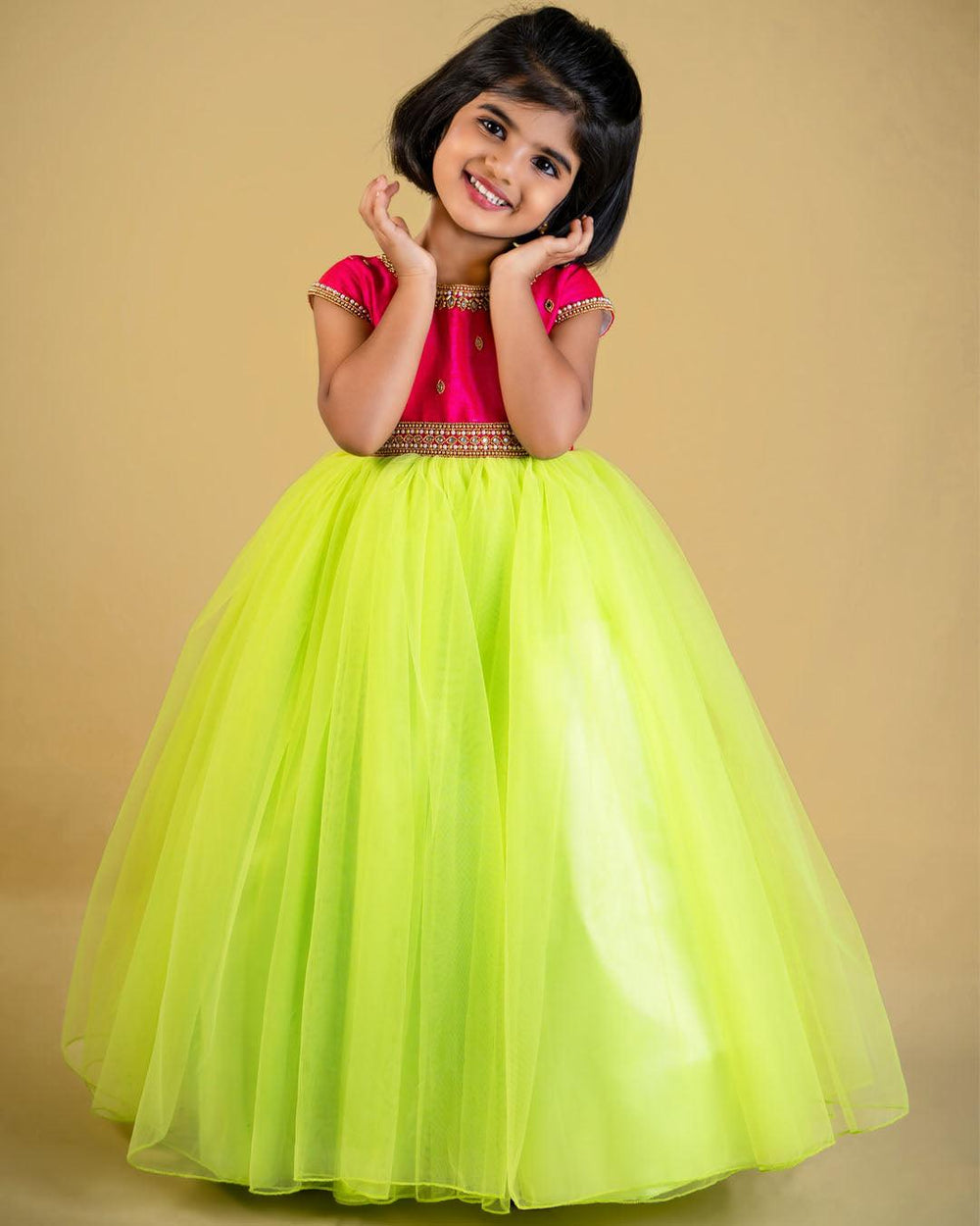 Lime Green & Pink Combo Partywear Hand Embroidery Long Gown
Material: Lime Green shade mono nylon softnet fabric is used for the bottom of the skirt. Rany pink blended silk fabric with heavily embroidery handwork on the neck