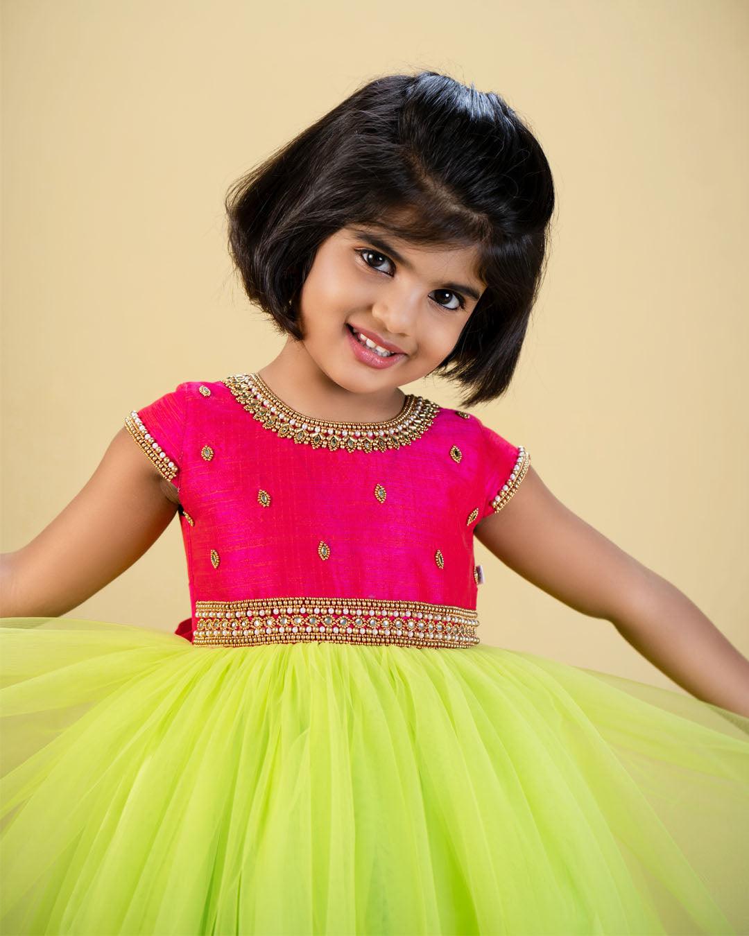 Lime Green & Pink Combo Partywear Hand Embroidery Long Gown
Material: Lime Green shade mono nylon softnet fabric is used for the bottom of the skirt. Rany pink blended silk fabric with heavily embroidery handwork on the neck