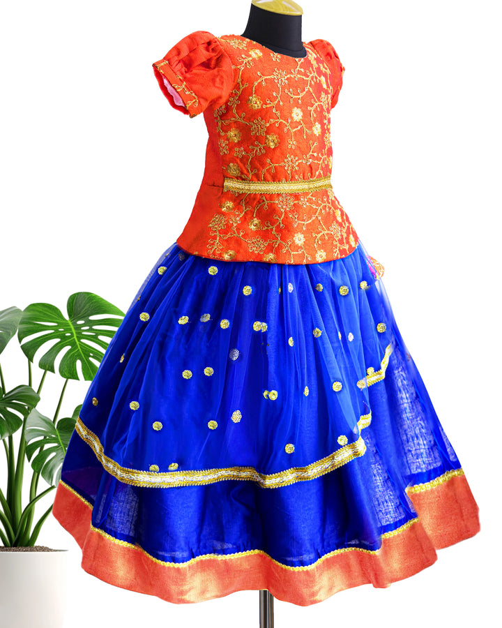 Royal blue and orange sequin embroidery lehenga choli for baby girls
South Indian traditional birthday dress for girls
Sequin partywear lehenga for toddlers
Flared lehenga choli set for baby girls
Royal blue orange festive dress for kids
Designer birthday outfit for baby girls
Stanwells Kids ethnic partywear lehenga