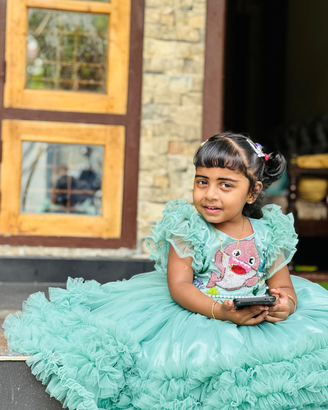 Pastel green baby shark ruffles birthday frock for baby girls.