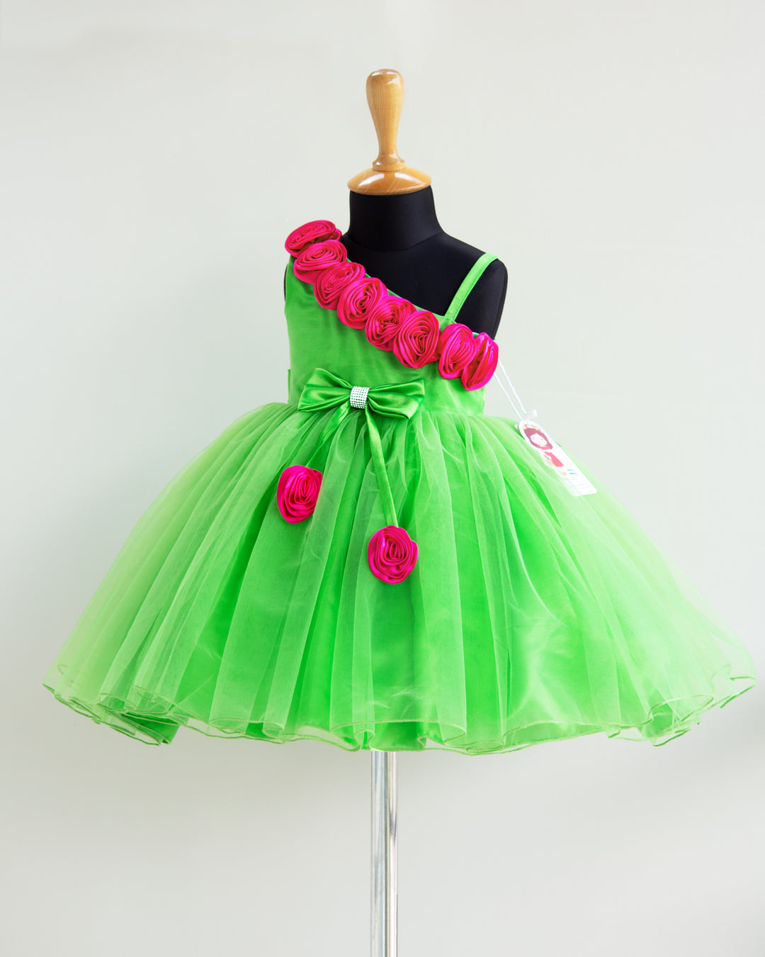 greenfrocks | girls partywear dreses | infants partywear dresses | dresses for kids online buy | stanwells kids | pink flower frock | strap sleeve frocks | birthday dresses | 1 year birthday | parrot green | neon green |