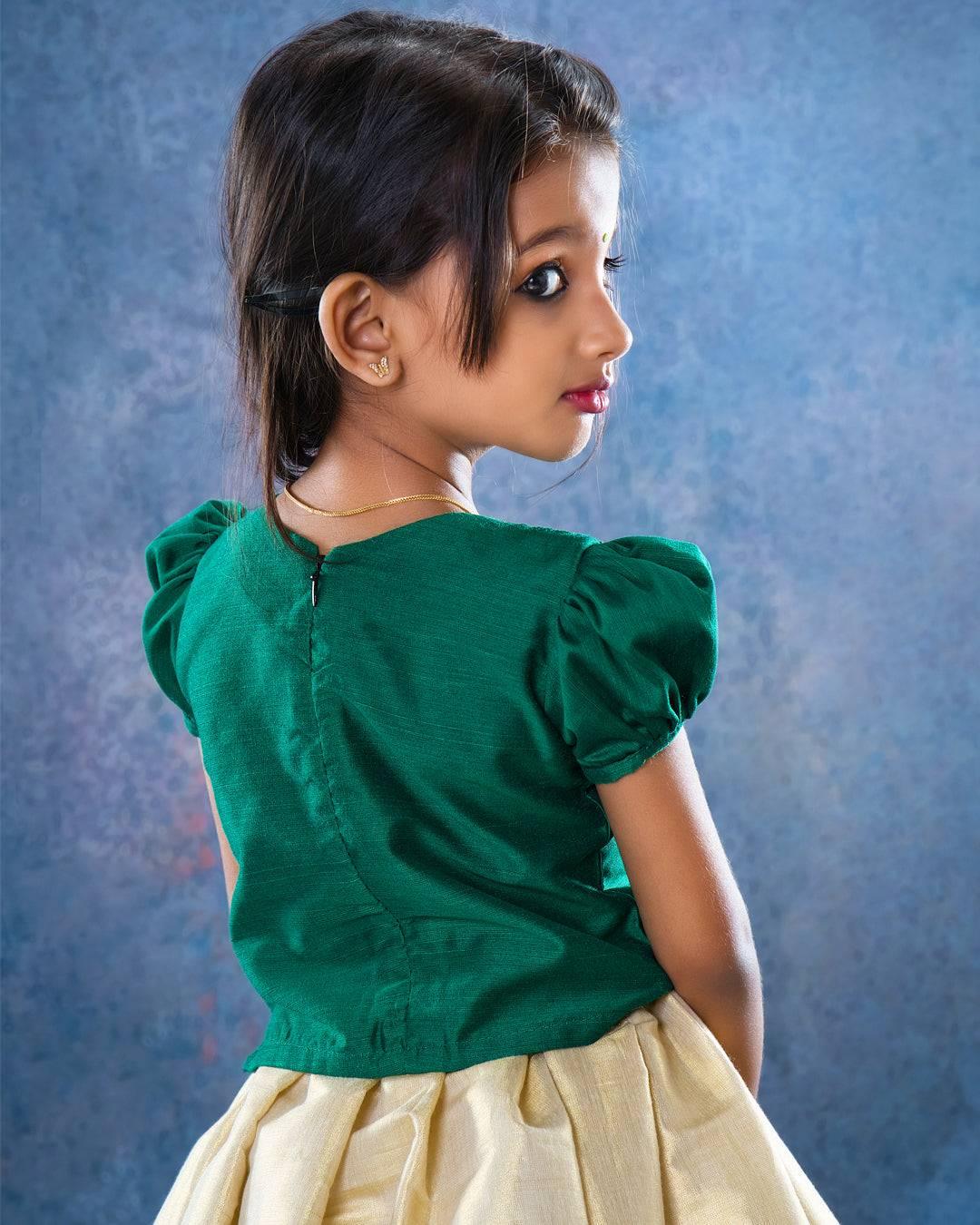 Cream & GreenTraditional Handwork Embroidery Lehenga Choli
Material: Cream colour kerala soft tissue silk fabric with dark green shade slub silk fabric with one side hand embroidery pattern and highlighted with glass beads