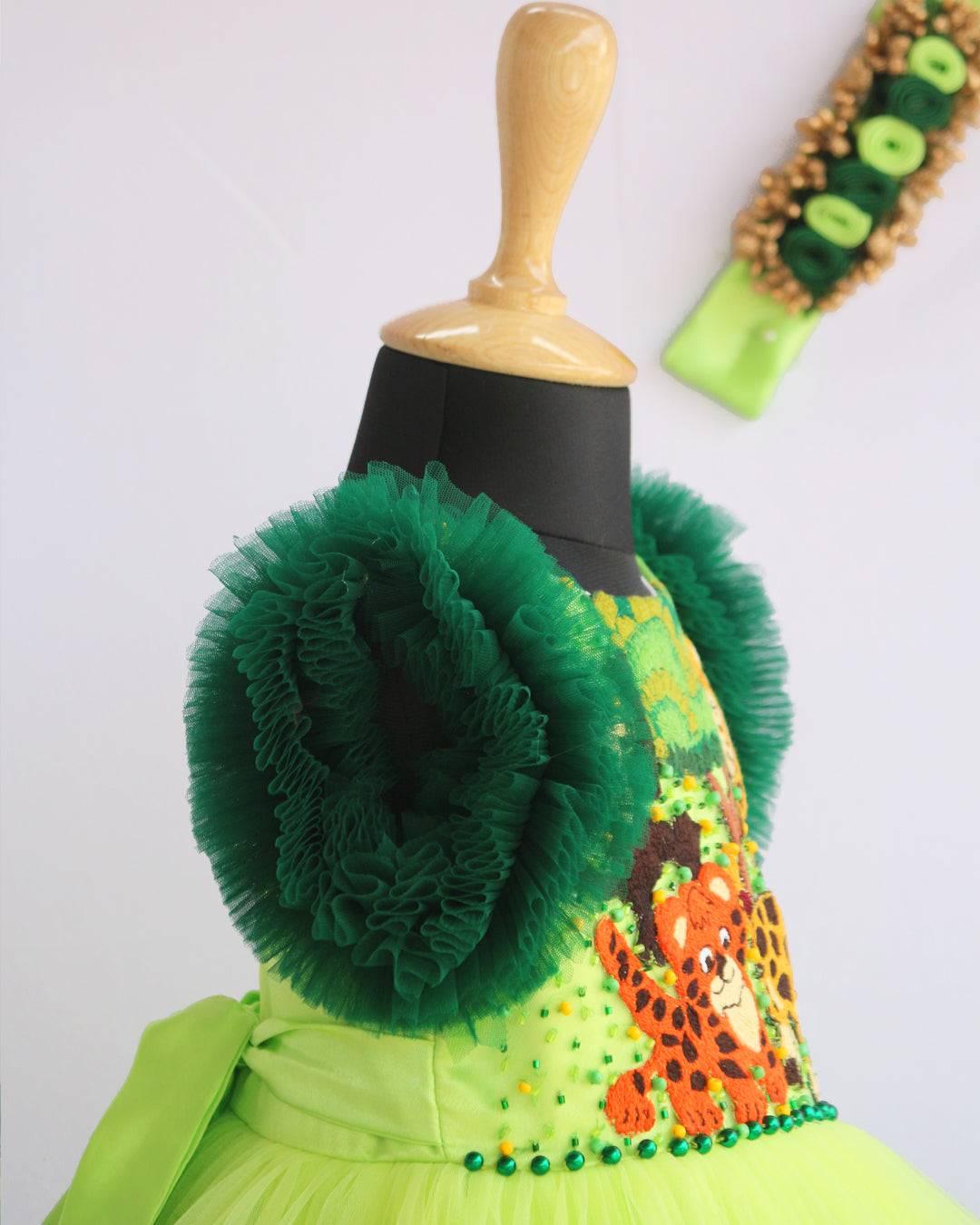 Lime Green & Dark green Animal Theme Jungle Frock
Material: Lime Green & Dark Green Animal Theme Jungle Frock is made with soft nylon mono net with two layered and ruffles on each end portion. Yoke portion is d