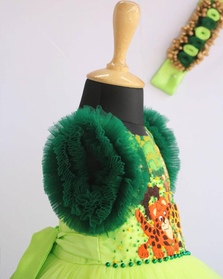 Lime Green & Dark green Animal Theme Jungle Frock
Material: Lime Green & Dark Green Animal Theme Jungle Frock is made with soft nylon mono net with two layered and ruffles on each end portion. Yoke portion is d