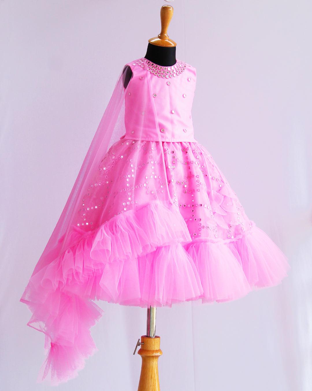 Baby Pink Organza Mirror work Ruffles Lehenga Choli set
Material: Baby Pink organza net is used for making this beautiful skirt & top .Top portion of the dress is designed with baby pink net fabric with mirror embroi