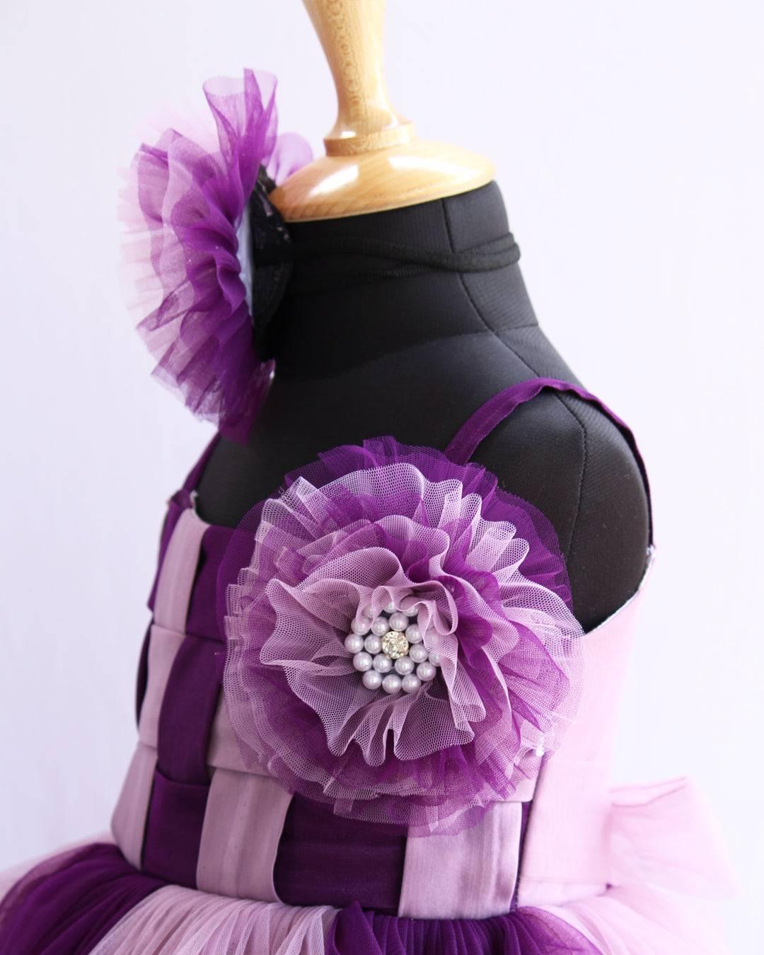 Purple & Pastel Pink Double Shade Layered Frock
Material: Purple and Pastel pink nylon net is used as in the skirt and yoke part of the dress. In the yoke portion two colours are given in a weaving pattern for an
