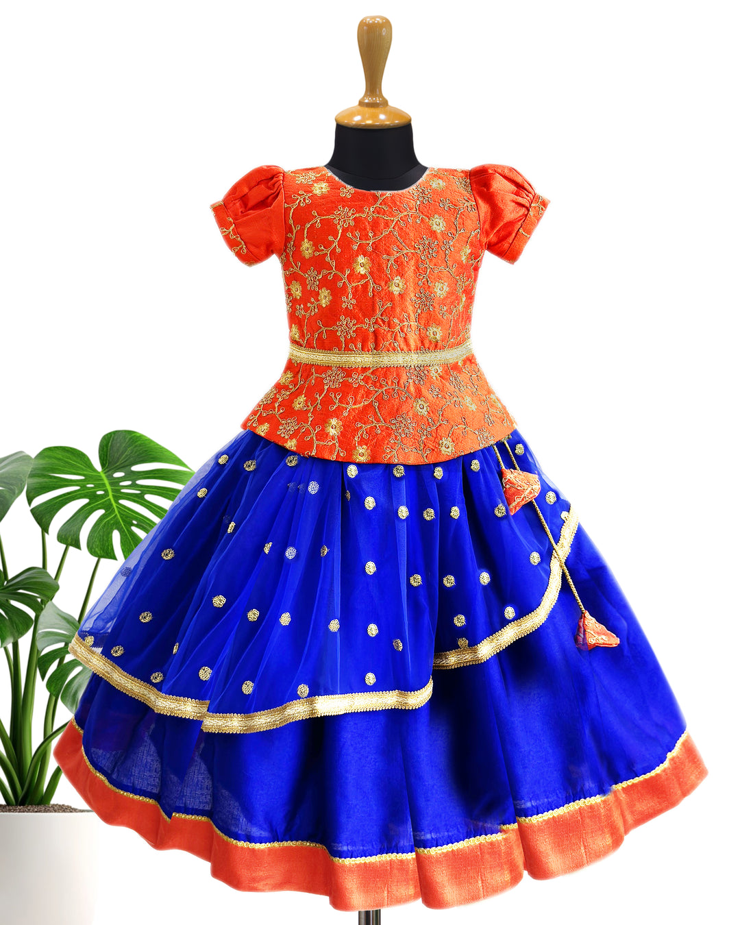 Royal blue and orange sequin embroidery lehenga choli for baby girls
South Indian traditional birthday dress for girls
Sequin partywear lehenga for toddlers
Flared lehenga choli set for baby girls
Royal blue orange festive dress for kids
Designer birthday outfit for baby girls
Stanwells Kids ethnic partywear lehenga