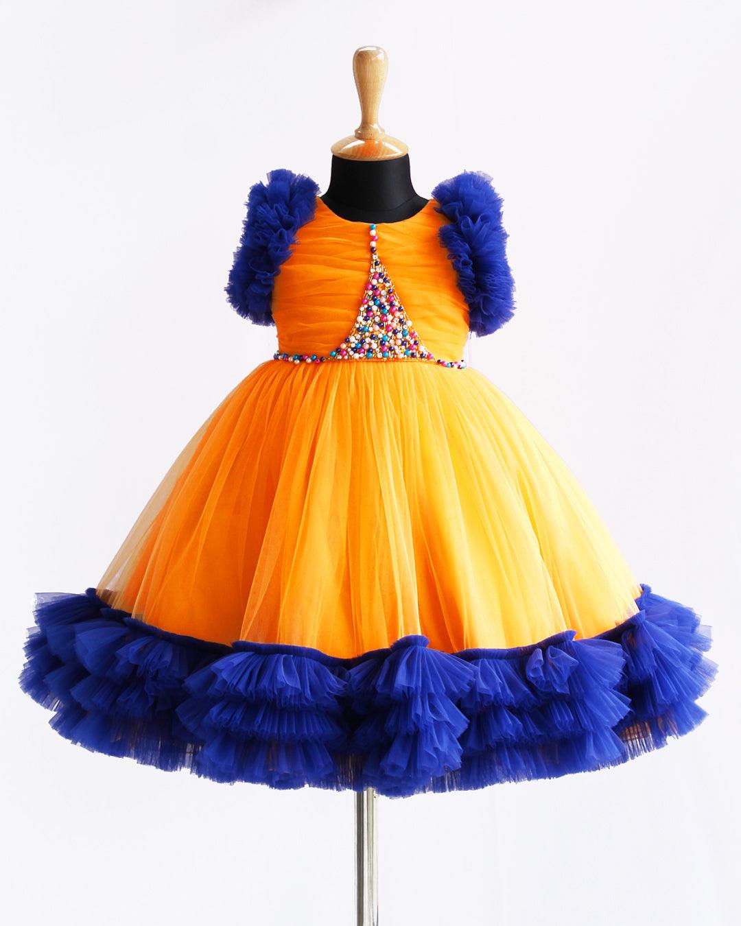 Sun Yellow & Navy blue combo Paris Handwork Birthday Gown
Material: Sun Yellow & Navy blue soft nylon net is used for making this beautiful Gown .Yoke portion of the gown is designed with yellow net with multi colours