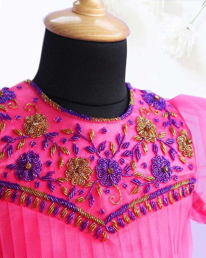 Peach & Violet combo Handwork Ruffles Party wear Frock
Material: Peach colour nylon net material is used as pleated design in the yoke portion with Heavy quality ultra satin as the primary lining .This satin lining give