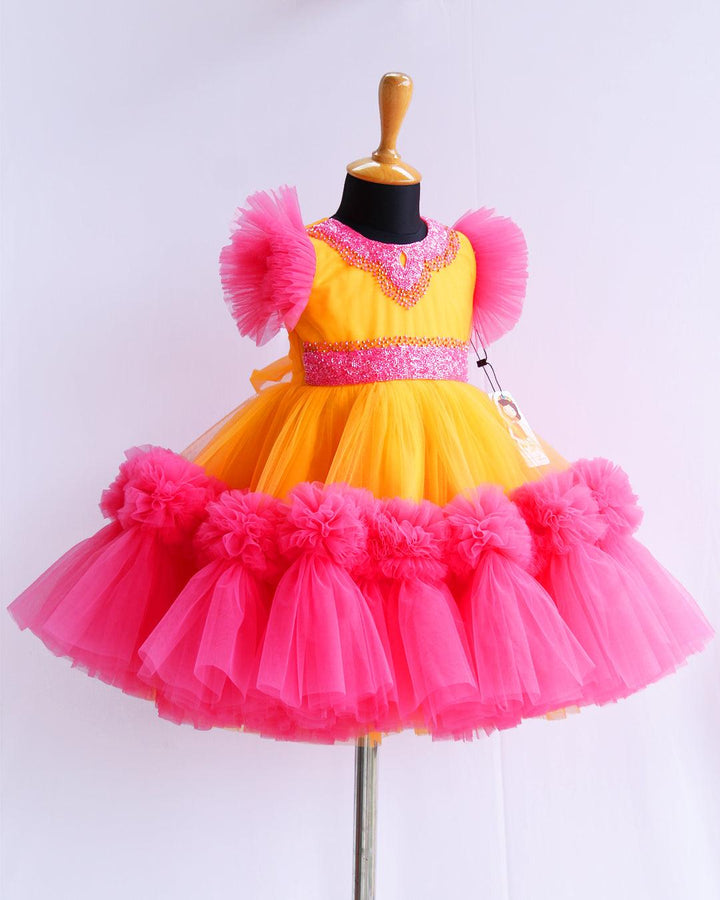 Sun Yellow & Peach Flarred Handwork Frock
Material: Sun Yellow & Peach soft nylon net is used for making this beautiful frock.Yoke portion of the frock is designed with yellow net with peach and golden