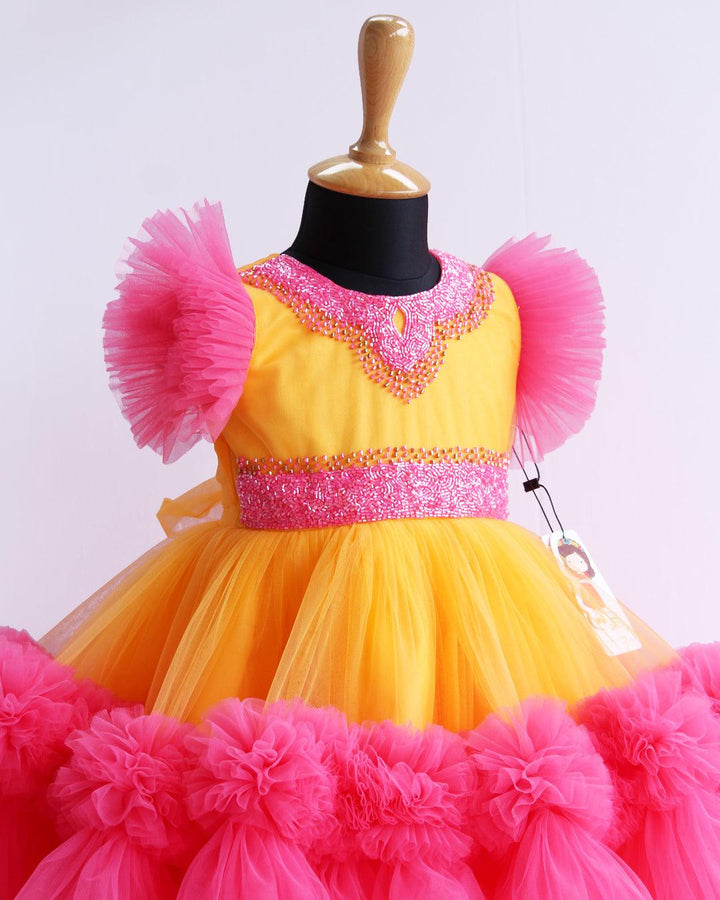 Sun Yellow & Peach Flarred Handwork Frock
Material: Sun Yellow & Peach soft nylon net is used for making this beautiful frock.Yoke portion of the frock is designed with yellow net with peach and golden