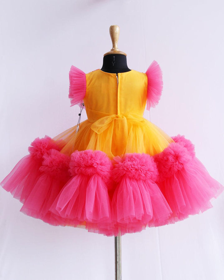 Sun Yellow & Peach Flarred Handwork Frock
Material: Sun Yellow & Peach soft nylon net is used for making this beautiful frock.Yoke portion of the frock is designed with yellow net with peach and golden