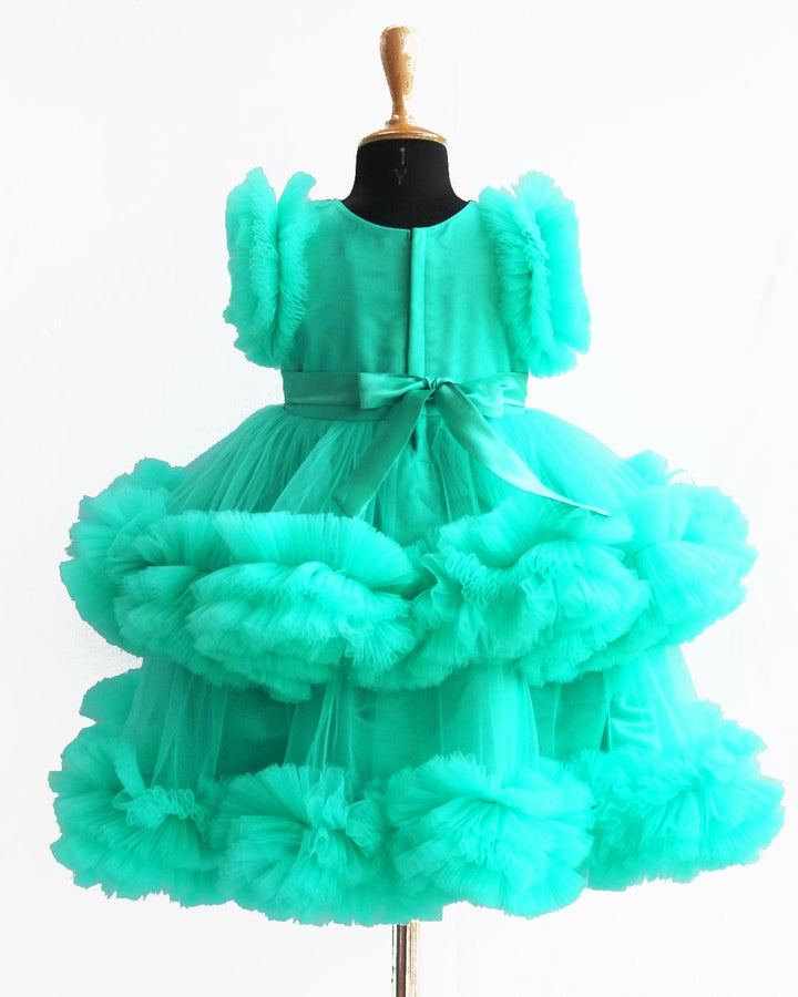 Sea Green Handwork Two Layer Ruffled Frock
Material: Sea Green Shade Pleated Ruffled Frock mono net with layered and ruffles on the end portion. Yoke portion is designed with pleated pattern and golden beade