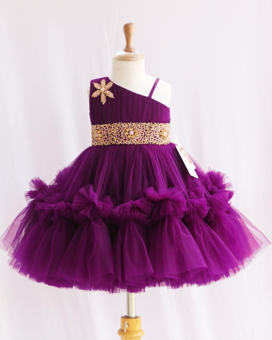 Purple Shade Pleated Ruffled Frock
Material: Purple Shade Pleated Ruffled Frock mono net with layered and ruffles on the end portion. Yoke portion is designed with pleated pattern and a handwork in t