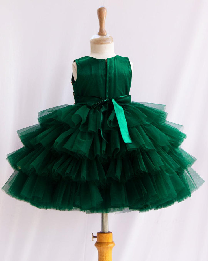 Bottle Green Hand Embroidery Layer Frock
Material: Bottle Green shade mono nylon soft net fabric layered with premium ultra satin is used for shining. Yoke portion is fully hand worked with reddish meroon