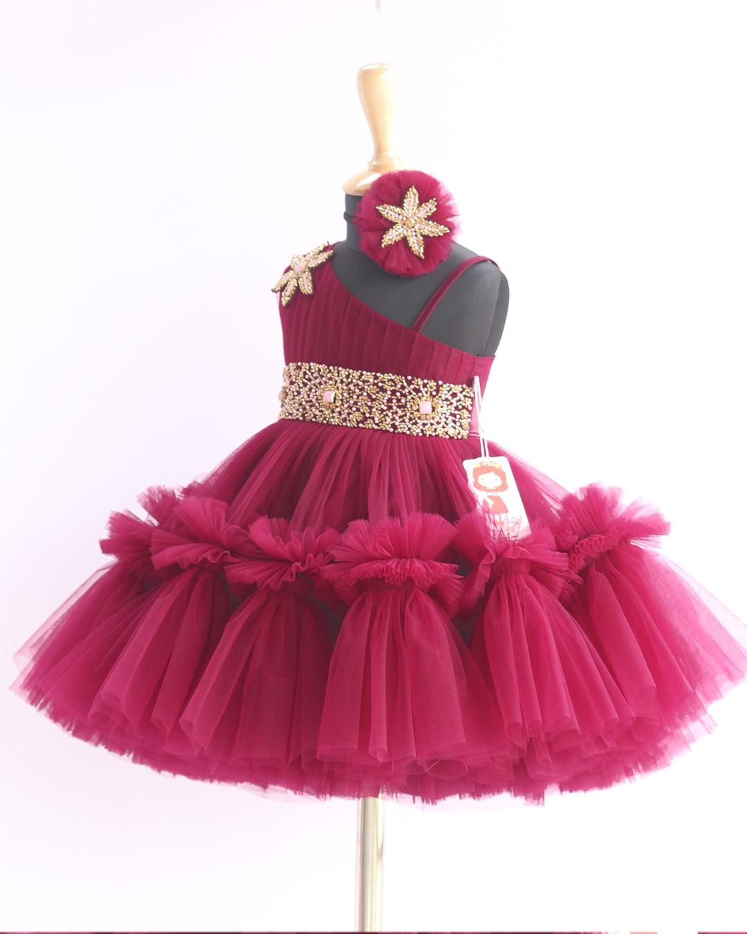 Grapevine Pleated Ruffled Birthday Frock.
Material: Aishu's Purple Shade Pleated Ruffled Frock mono net with layered and ruffles on the end portion. Yoke portion is designed with pleated pattern and a handw