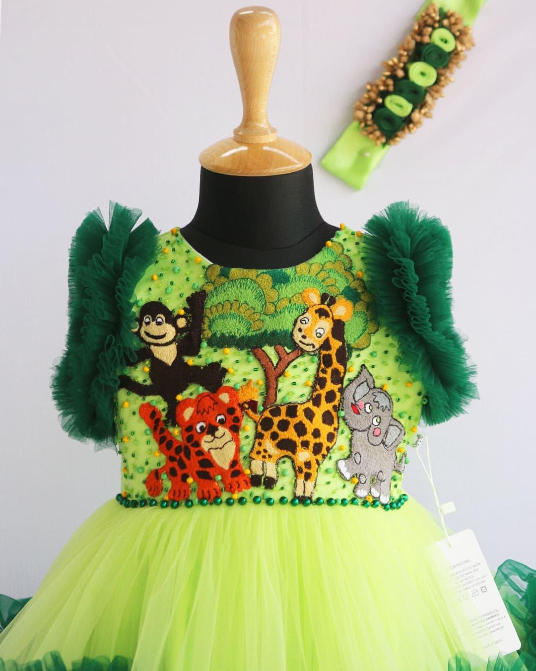 Lime Green & Dark green Animal Theme Jungle Frock
Material: Lime Green & Dark Green Animal Theme Jungle Frock is made with soft nylon mono net with two layered and ruffles on each end portion. Yoke portion is d