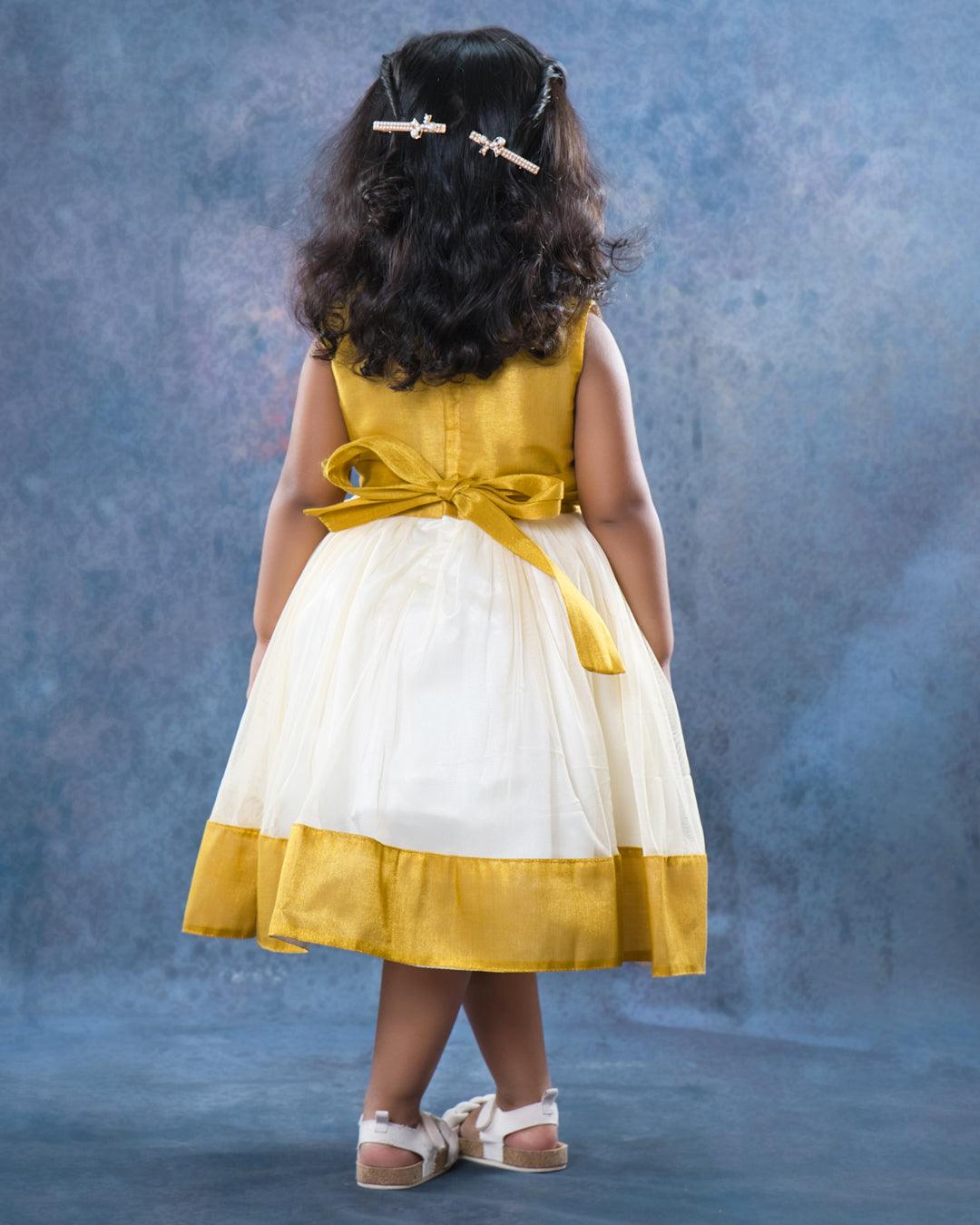 Cream & Gold handwork Traditional Knee Length Frock
Material:  Cream & Gold soft quality net with premium cream ultra satin inside for shining, Meroon silk material with hand embroidery beads on the neck and body