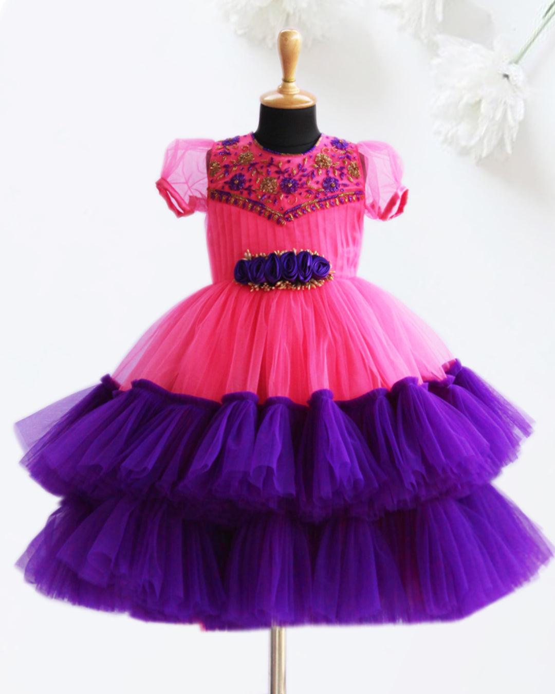 Peach & Violet combo Handwork Ruffles Party wear Frock
Material: Peach colour nylon net material is used as pleated design in the yoke portion with Heavy quality ultra satin as the primary lining .This satin lining give