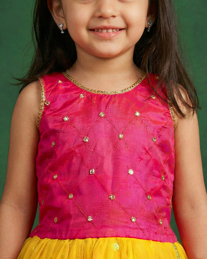 Yellow and magenta mirror work lehenga choli for baby girls

South Indian traditional birthday dress for girls

Mirror work festive wear lehenga choli

Baby girls ethnic partywear dress

Designer lehenga choli set for toddlers

Kids traditional outfit yellow magenta

Stanwells Kids festive birthday dress