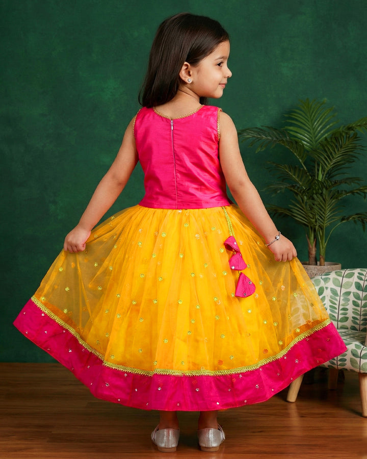 Yellow and magenta mirror work lehenga choli for baby girls

South Indian traditional birthday dress for girls

Mirror work festive wear lehenga choli

Baby girls ethnic partywear dress

Designer lehenga choli set for toddlers

Kids traditional outfit yellow magenta

Stanwells Kids festive birthday dress