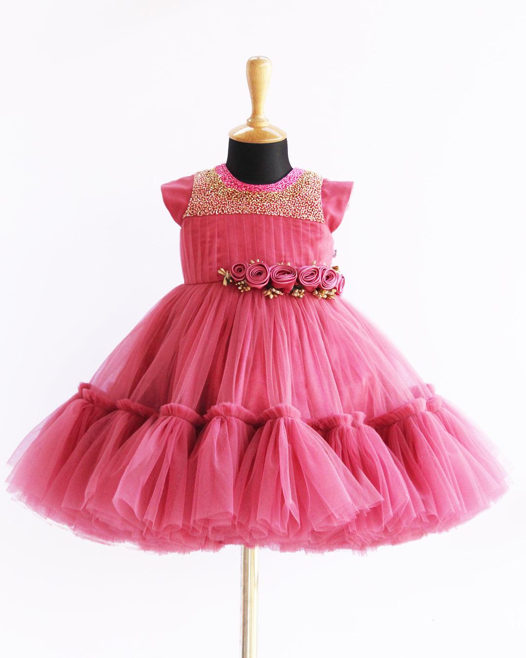 Blush Pink colour Hand embroidery Ruffles Birthday Flower Frock
Material : Blush Pink colour nylon net material is used in the skirt portion with Heavy quality ultra satin as the primary lining .This satin lining give the glossy