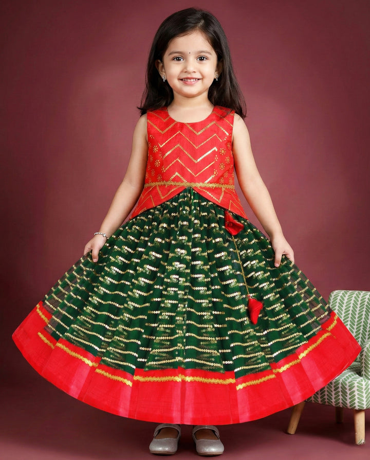 Bottle green and red sequin embroidery lehenga choli for baby girls

Traditional South Indian birthday dress for girls

Embroidered festive wear lehenga for toddlers

Designer sequin work partywear dress for kids

Baby girls ethnic lehenga choli set

Stanwells Kids festive birthday outfit

Green red designer lehenga for baby girls