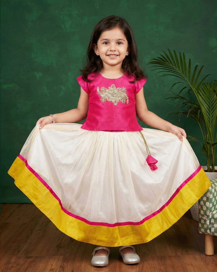 Kerala traditional lehenga choli for baby girl

cream pink birthday lehenga for kids

baby girls Kerala festive dress

ethnic lehenga choli for toddlers

Stanwells Kids Kerala lehenga outfit