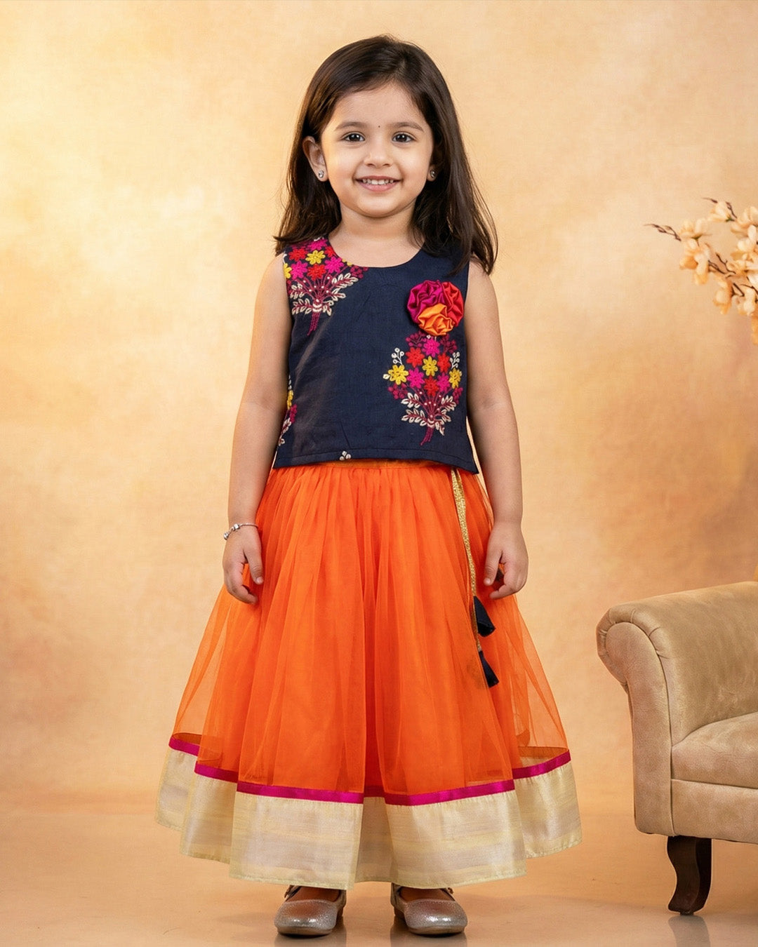 Orange and black combo lehenga choli set for baby girls

Traditional birthday dress for girls

Baby girls festive wear lehenga

Stylish ethnic dress for toddlers

Black orange designer lehenga for baby girls

Kids partywear traditional dress

Stanwells Kids ethnic birthday outfit