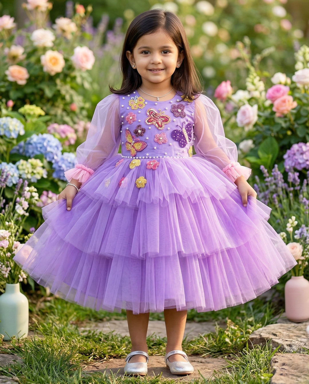 Lavender Butterfly Applique step Frock.
Material: Lavender Shade Butterfly Applique three step frock.Premium quality lilac colour satin is used as the lining and lavender colour nylon net is used in three