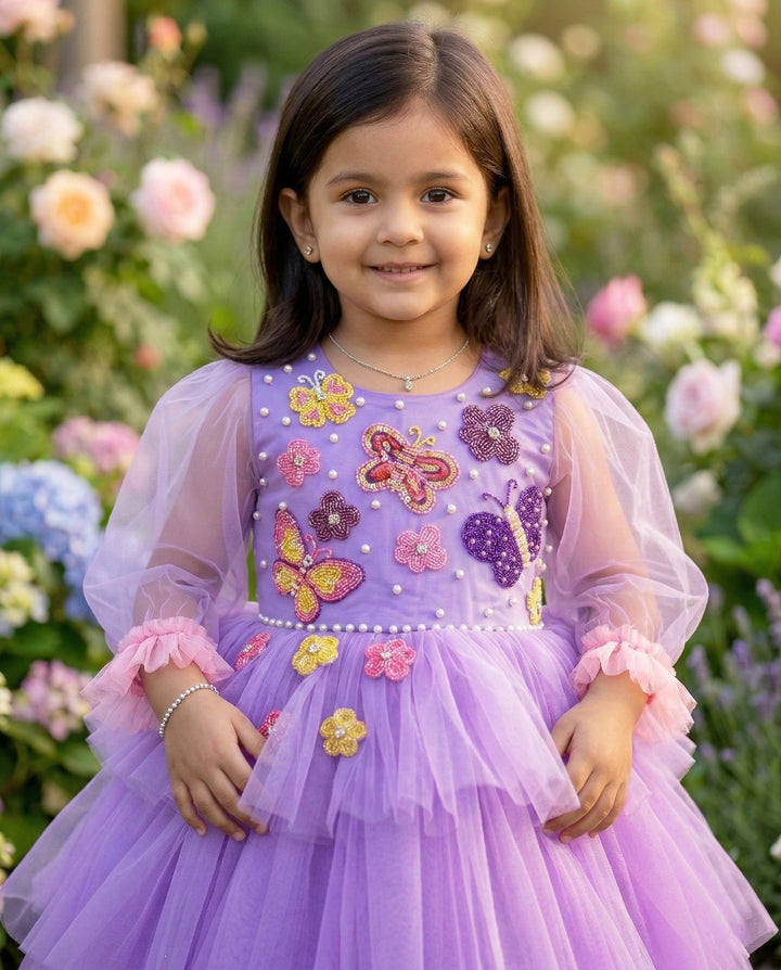 Lavender Butterfly Applique step Frock.
Material: Lavender Shade Butterfly Applique three step frock.Premium quality lilac colour satin is used as the lining and lavender colour nylon net is used in three