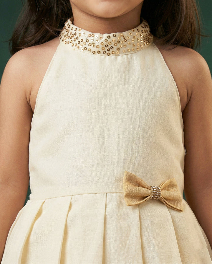 Cream golden Onam frock side view – Stanwells Kids