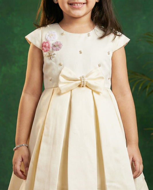 Cream satin box pleated birthday frock front view – Stanwells Kids