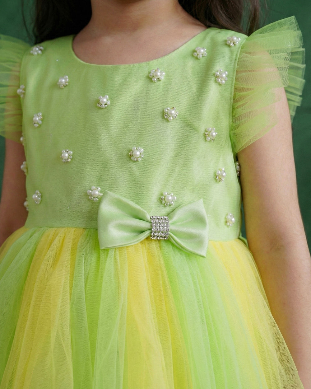 Light green and baby yellow birthday frock for baby girls

Partywear dress for girls 6M–8Y

Stylish dual-color frock for toddlers

Elegant baby girls birthday outfit

Festive wear frock for kids

Stanwells Kids yellow green party dress

Designer birthday frock for baby girls
