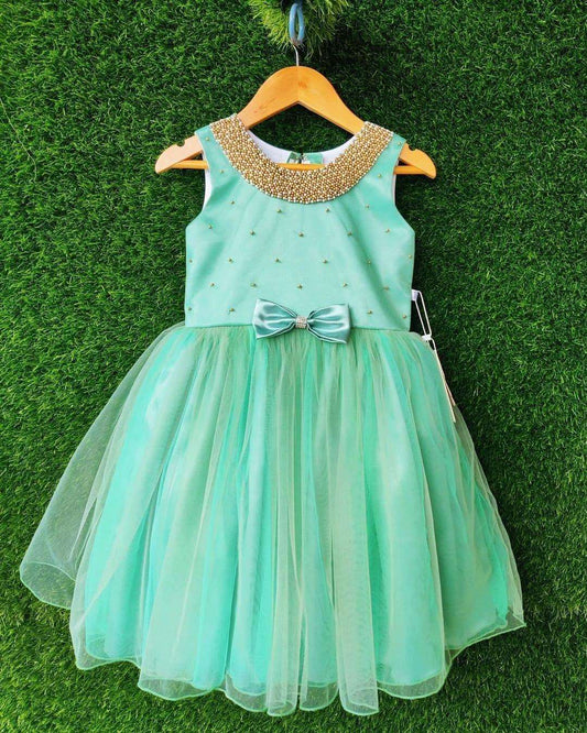 Pastel green beaded neck knee length frock front view baby girl – Stanwells Kids