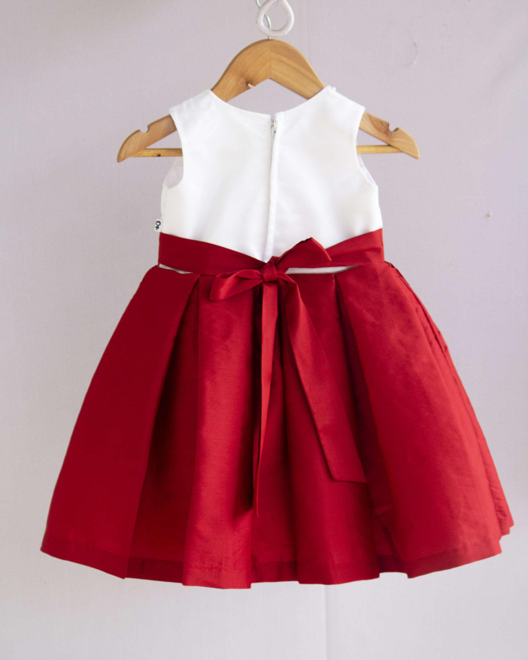 Red & White Combo Baby-Girls Box Pleated Tafetta Silk Handwork Frock
Material : Red shade party perfect box pleats frock is made with soft taffeta silk fabric. The yoke portion of the frock is designed in transparent neck design with