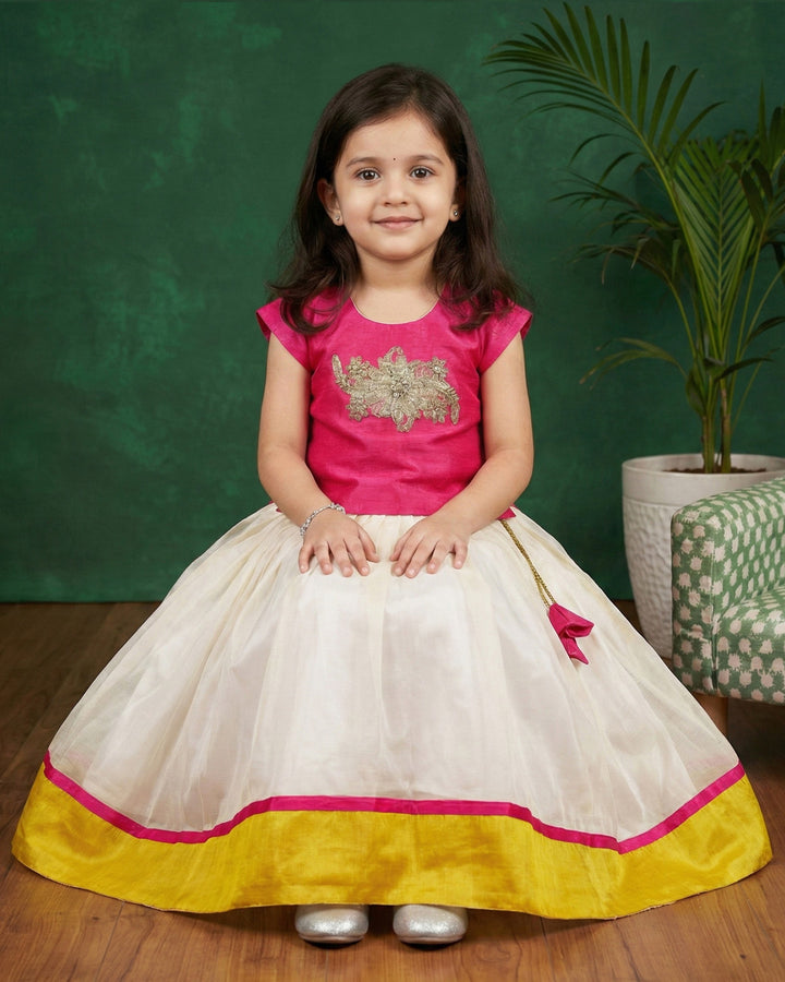 Kerala traditional lehenga choli for baby girl

cream pink birthday lehenga for kids

baby girls Kerala festive dress

ethnic lehenga choli for toddlers

Stanwells Kids Kerala lehenga outfit